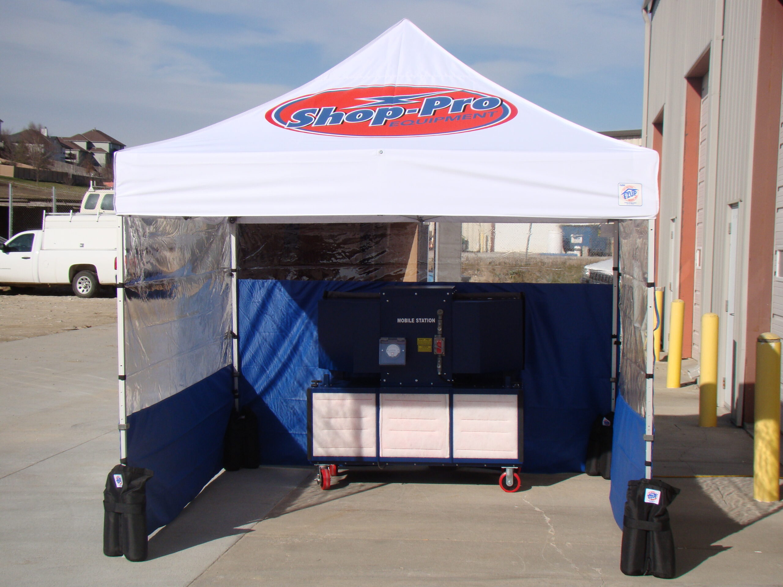 Mobile Tech Station with optional quick setup enclosure. Showcased outdoors to demonstrate portability.