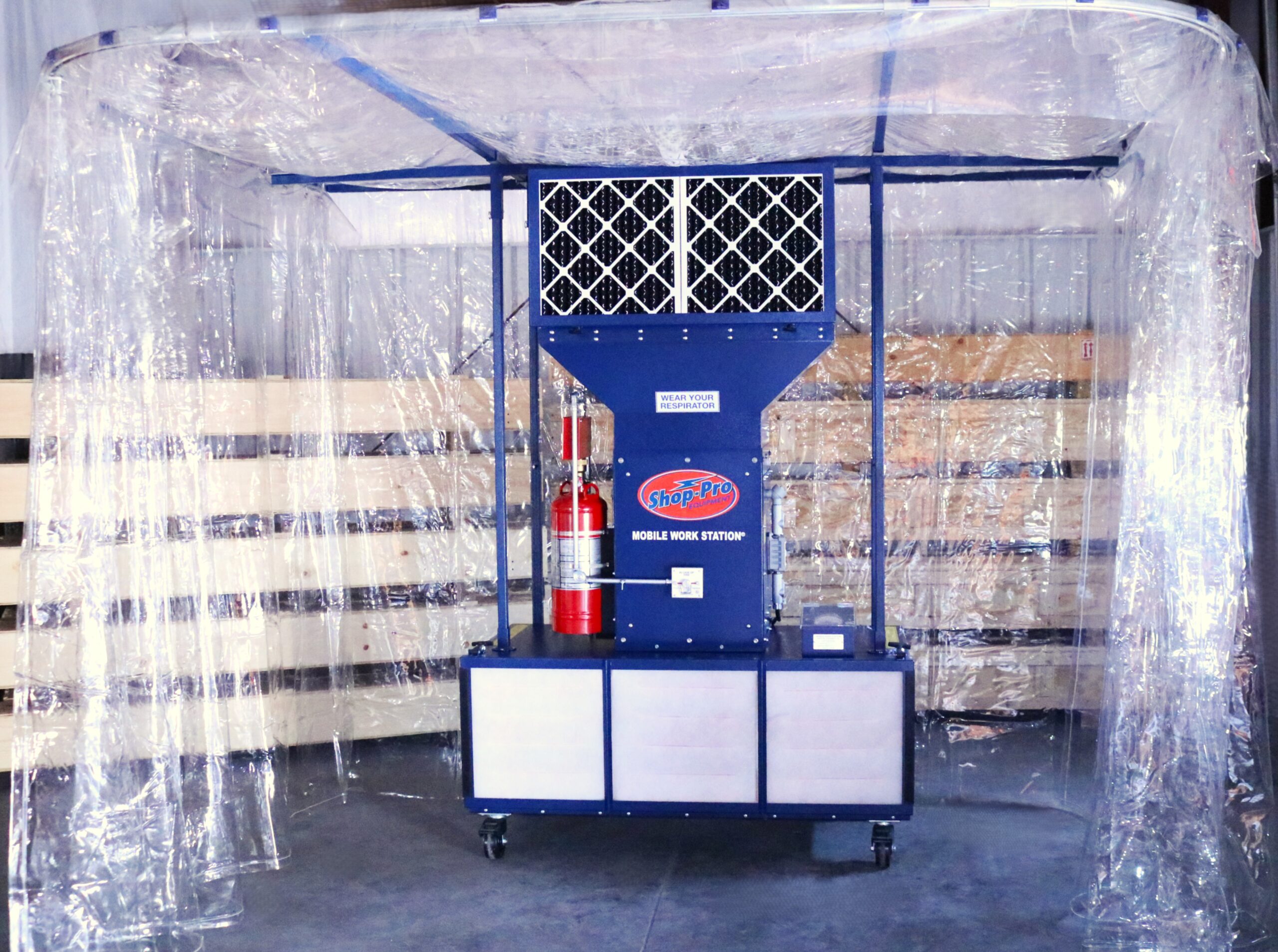 Mobile Work Station setup in a shop environment with enclosure and optional fire suppression. Showcases standard filters.